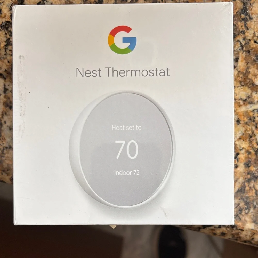 Google Nest Thermostat in White and Gray